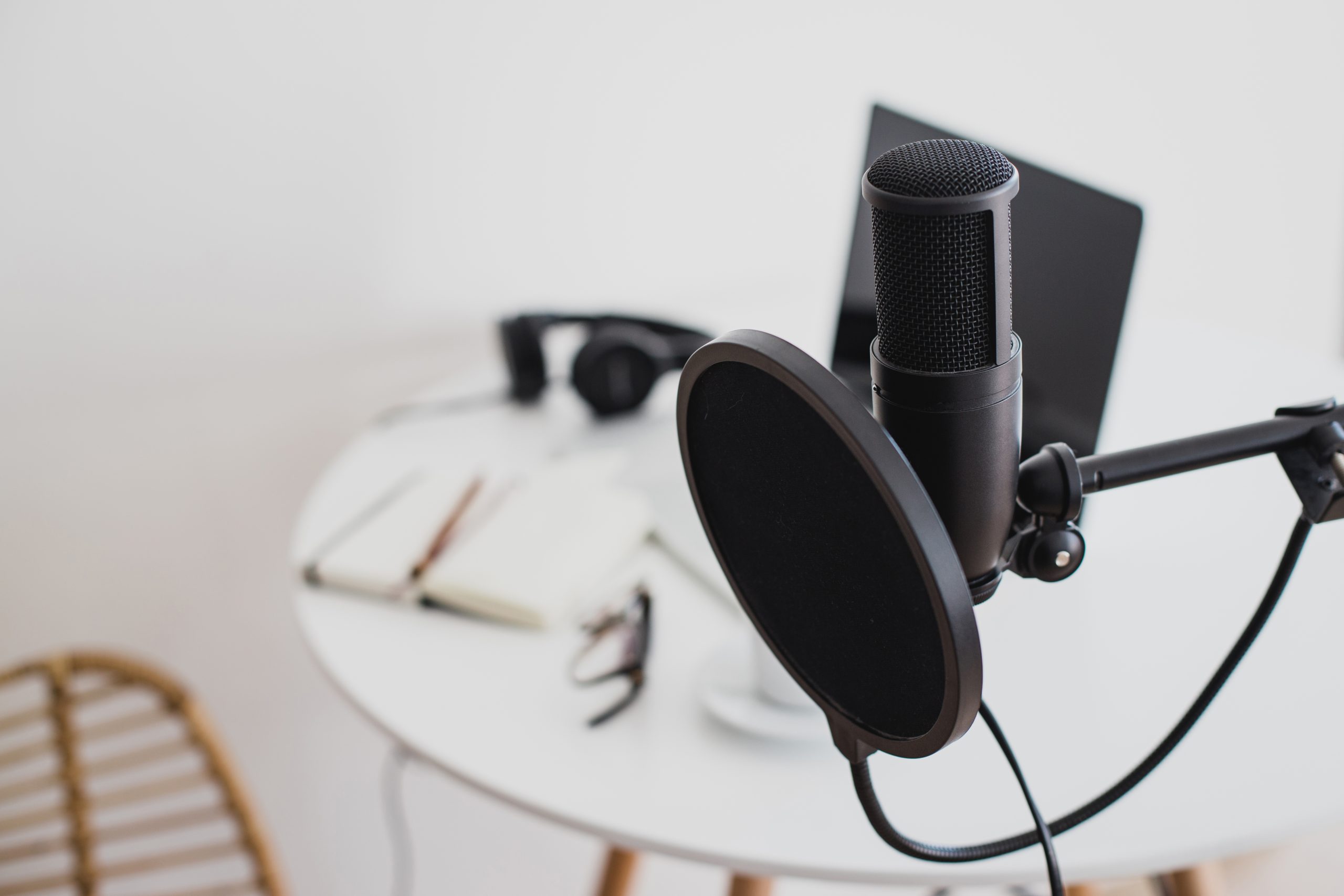 Microphone with a pop filter attached